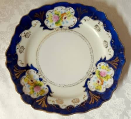 Vintage plate with royal blue, gold gilt and hand painted