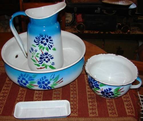 Beautiful 4 piece white, light and dark blue green and red enamel set-Made in Polland-Good condition