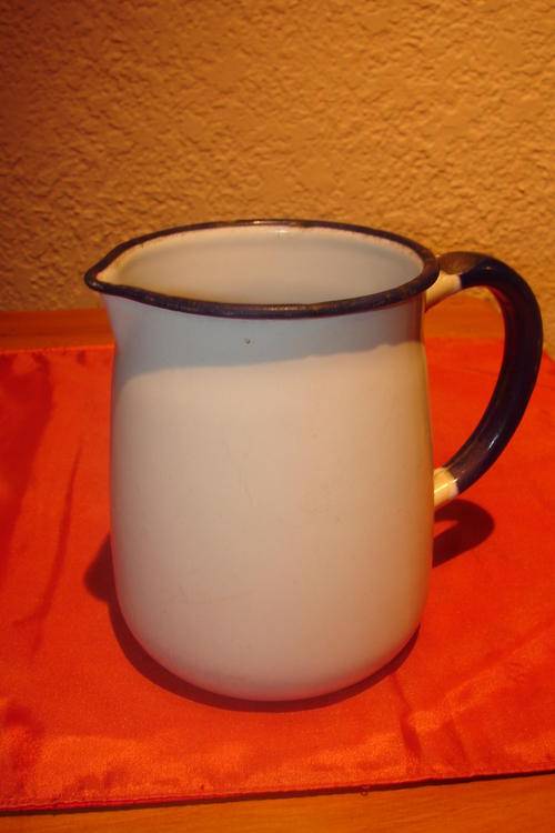 Vintage white Enamel Milk Jug with Blue trimming - height 13cm
