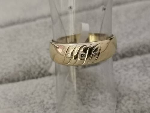 Detailed Gold Ring With Diamonds
