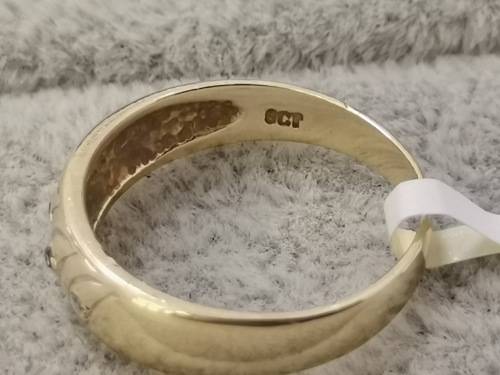 Detailed Gold Ring With Diamonds