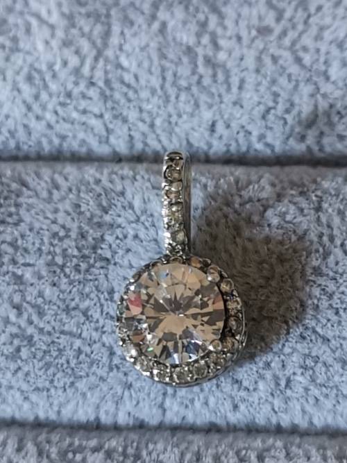 **R1 Auction**  Dazzling Silver Pendant