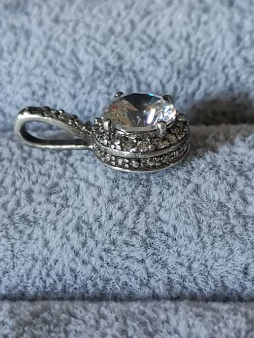 **R1 Auction**  Dazzling Silver Pendant