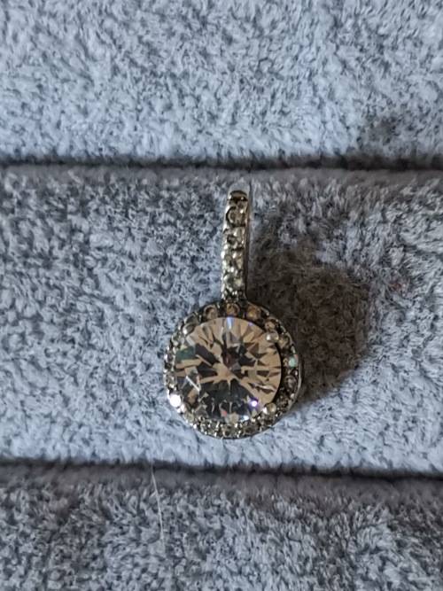 **R1 Auction**  Dazzling Silver Pendant