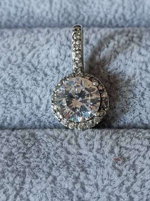 **R1 Auction**  Dazzling Silver Pendant