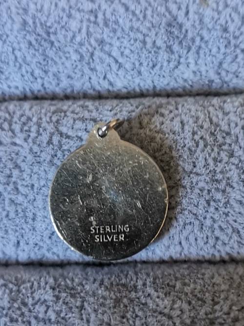 **R1 Auction**  Silver St. Christopher Pendant