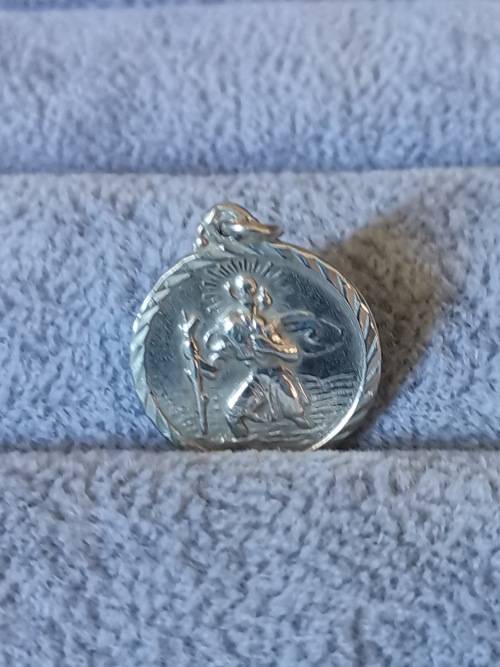 **R1 Auction**  Silver St. Christopher Pendant