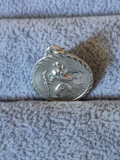 **R1 Auction**  Silver St. Christopher Pendant