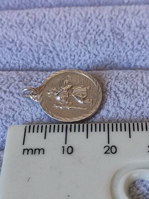 **R1 Auction**  Silver St. Christopher Pendant