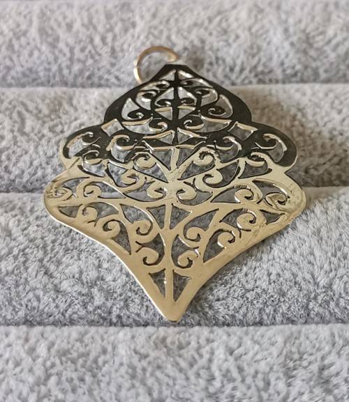 Detailed Silver Pendant