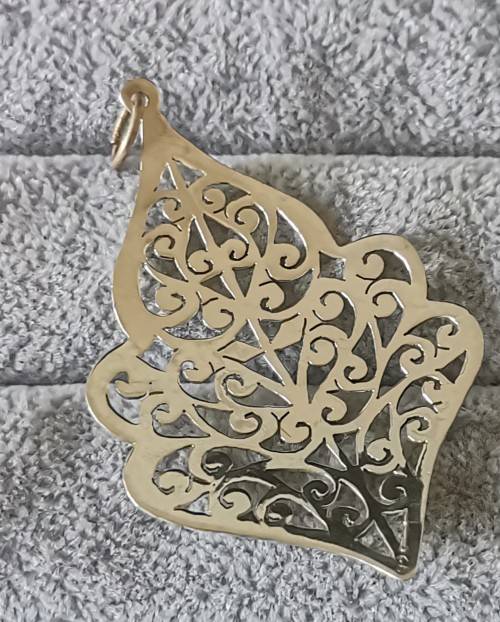 Detailed Silver Pendant