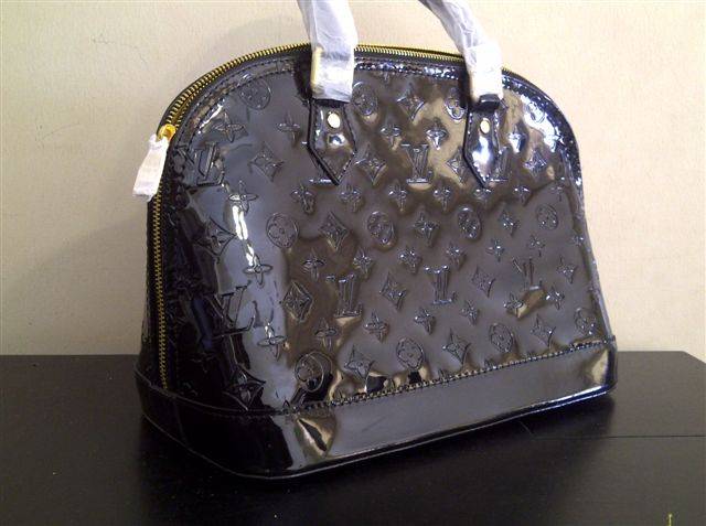 100 % LOUIS VUITTON