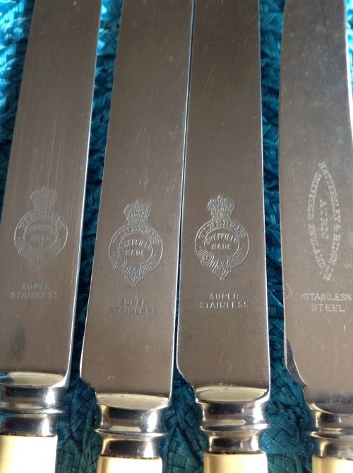 BONE HANDLE KNIVES MADE IN SHEFFIELD. AS NEW POSTAGE R 65.00 WE COMBINE ITEMS.