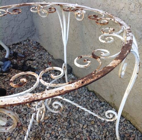 DISTRESSED ROUND WROUGHT IRON  NEEDS TLC AND GLASS TOP.