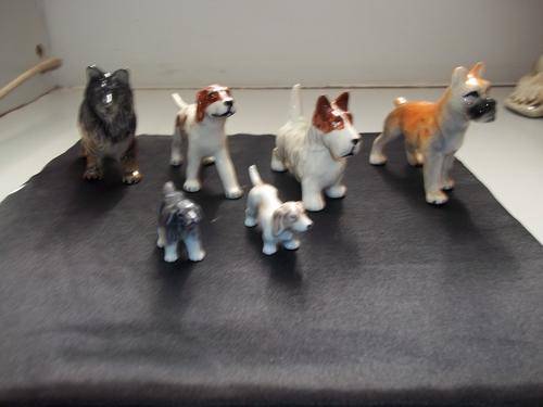 6 ASSORTED  PORCELIAN DOGS IN GOODCONDITION.