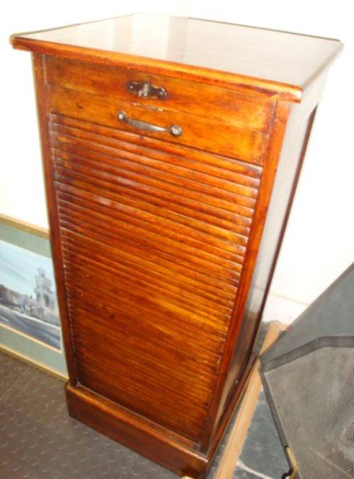 Roll Front Oak Fling Cabinet