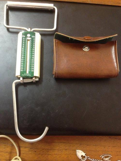 A portable hand fishermans scale Made in Germany