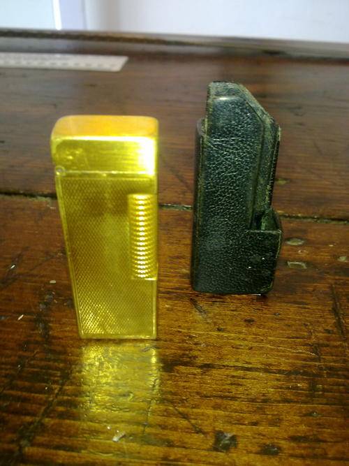 A great gold Dunhill lighter with cover
