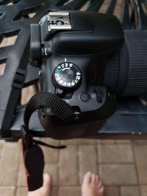 Very good condition rarely used canon 1300D with 18-55 mm lens, canon bag WIFI and more
