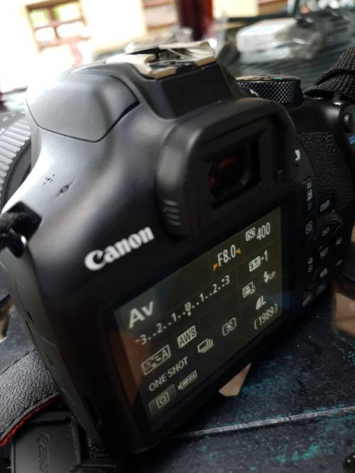 Very good condition rarely used canon 1300D with 18-55 mm lens, canon bag WIFI and more