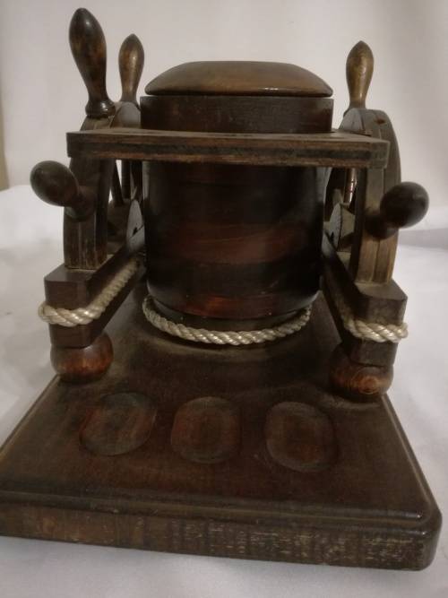 Vintage pipes and tobacco stand.