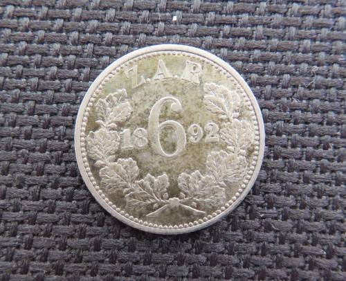 1892 6p Good looking toned Au coin