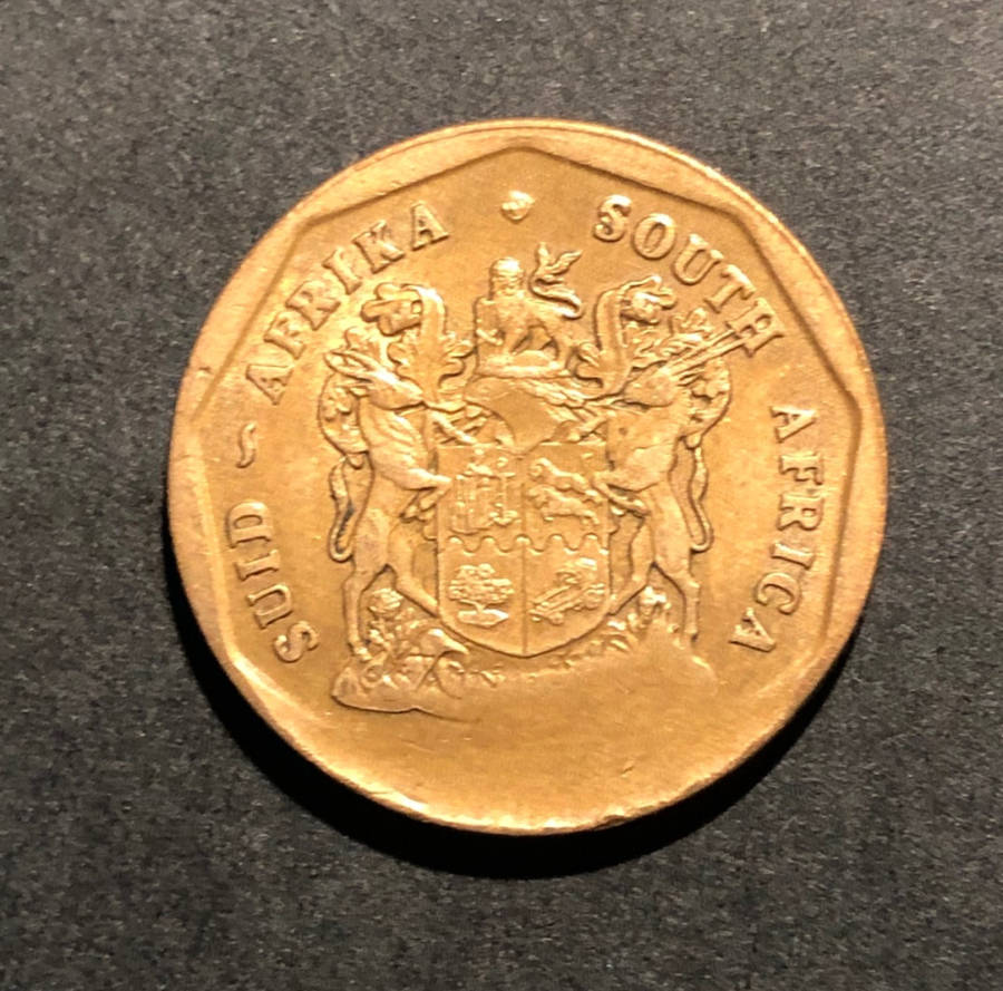 SPECTACULAR MINT ERROR - MAJOR DIE BREAK ON COPPER 50c COIN!
