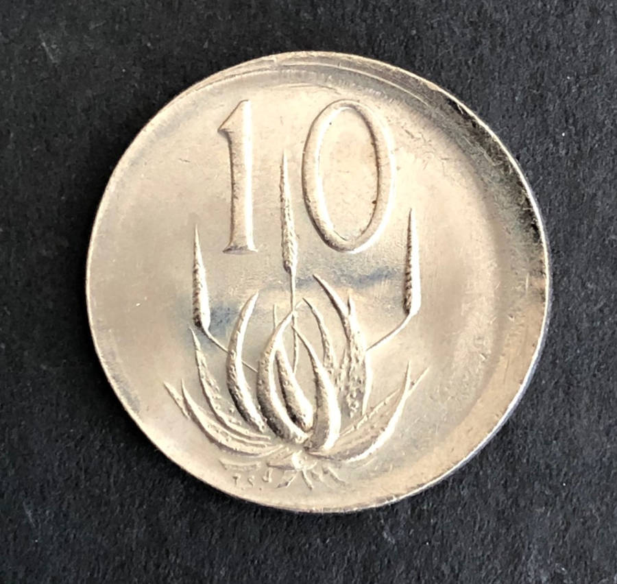MAJOR MINT ERROR - 10c COIN STRUCK OFF-CENTRE!