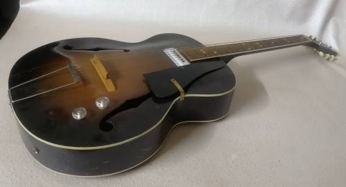 Beautiful antique Wizard electrical guitar in case for restoration