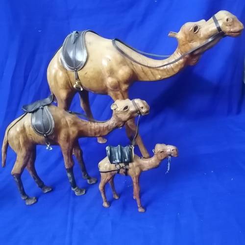 Awesome!! Group of Vintage Hand Carved Leather bound Camels