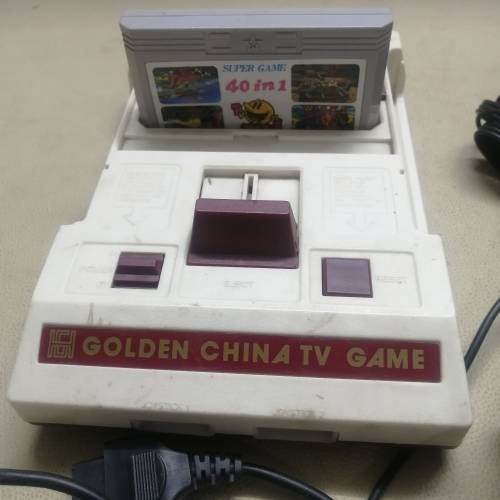 VINTAGE GOLDEN CHINA GAMING CONSOLE AND 40 GAME DISK