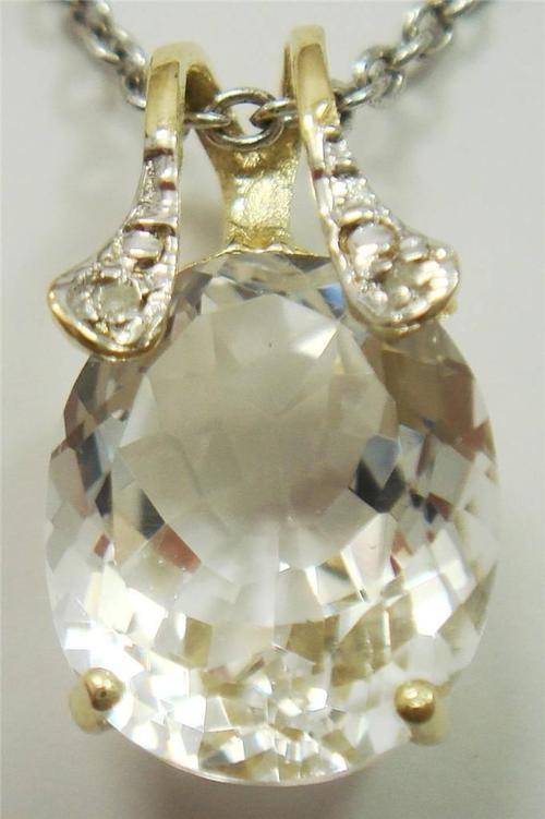 NICE 10KT SOLID YELLOW GOLD OVAL WHITE TOPAZ DIAMOND PENDANT.  GREAT!!!