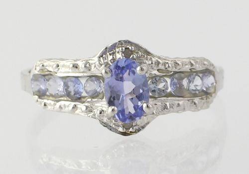 TANZANITE RING SET IN STERLING SILVER WITH DIAMOND ACCENTS SIZE 8 (P)