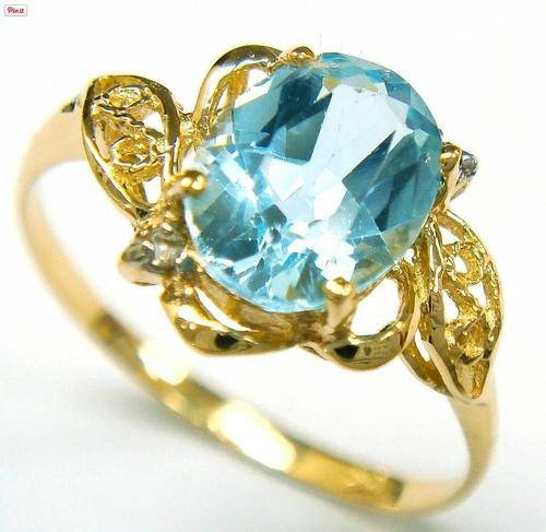 10KT YELLOW GOLD OVAL CUT BLUE TOPAZ & DIAMOND RING SIZE 7