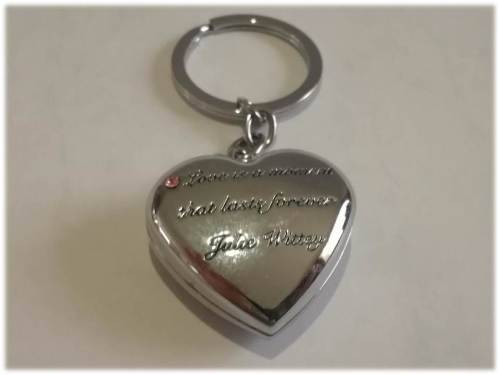 `Ponds` Key rings with engraved quote ` Love is a moment that lasts forever -  Julie Wittey`