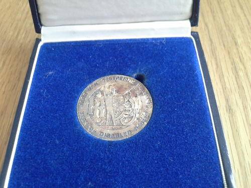 1986 TONED YEAR OF THE DISABLED SILVER R1