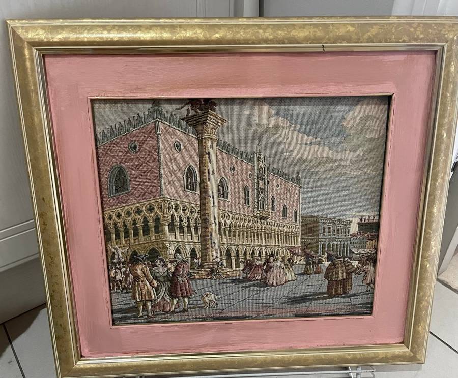 Framed tapestry scene