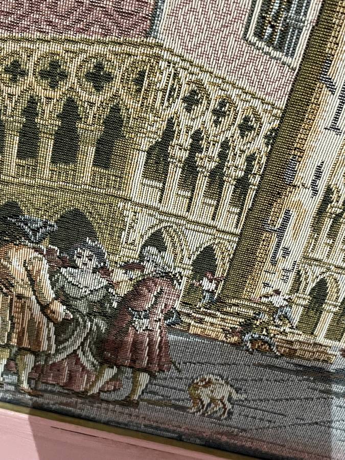 Framed tapestry scene