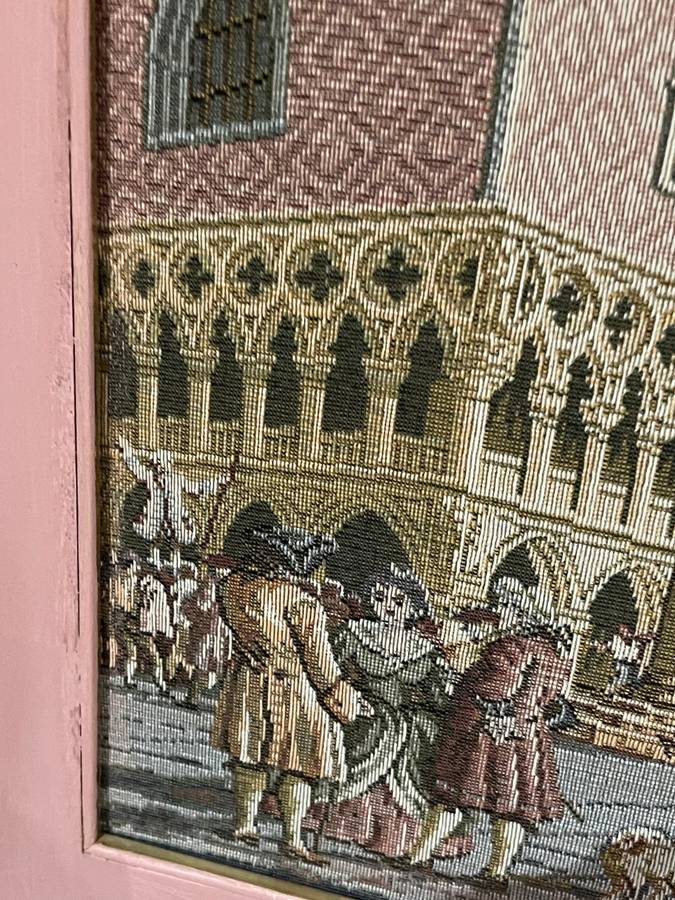 Framed tapestry scene