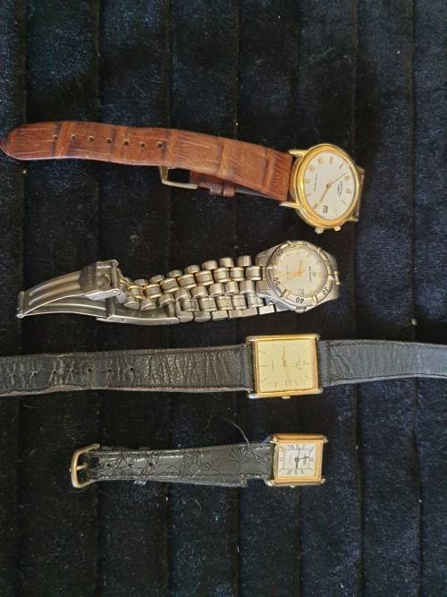 a JOBLOT OF WOMANS WATCHES SOLD AS IS NOT TESTED