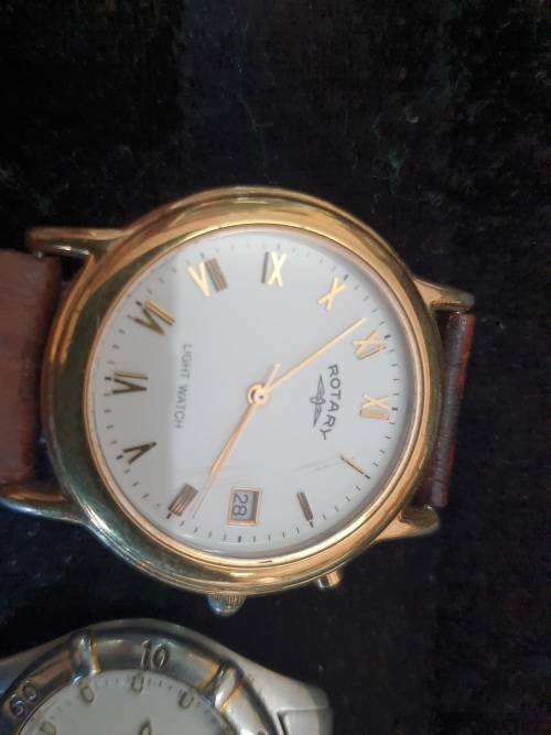 a JOBLOT OF WOMANS WATCHES SOLD AS IS NOT TESTED