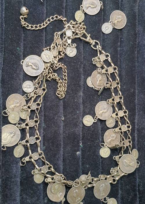 A VINTAGE ORNATE COIN BRONZE NECKLACE WITH 2 COINS LOOSE SOLD AS IS