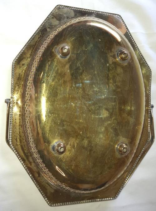 A VINTAGE SERVING TRAY SILVER PLATED SOLD AS IS