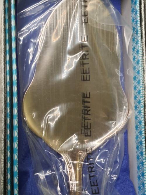 A COLLECTION OF EETRITE SILVERPLATED AND STAINLESS STEEL CAKE CUTTERS