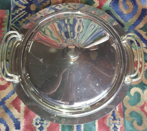 A VINTAGE STAINLESS STEEL WITH GOLD TONE HANDLES WARMER