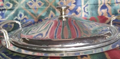 A VINTAGE STAINLESS STEEL WITH GOLD TONE HANDLES WARMER