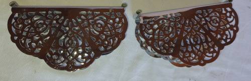 TWO STAINLESS STEEL ORNATE DESIGNED SERVIETTE HOLDERS IN MINT CONDITION SOLD AS IS