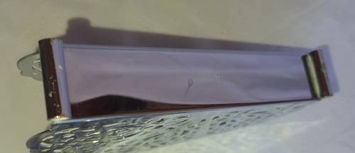 TWO STAINLESS STEEL ORNATE DESIGNED SERVIETTE HOLDERS IN MINT CONDITION SOLD AS IS