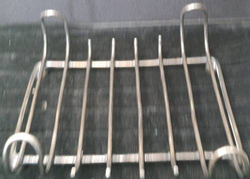 A COLLECTION OF 4 TOAST AND PLATE HOLDERS EPNS VINTAGE SOLD AS IS