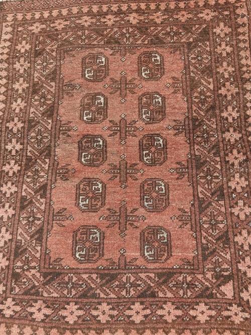 A VINTAGE PERSIAN CARPET USED DIAMENSIONS 42X32 INCHES APPROXIMATELY, IT IS A FAIRLY GOOD CONDITION